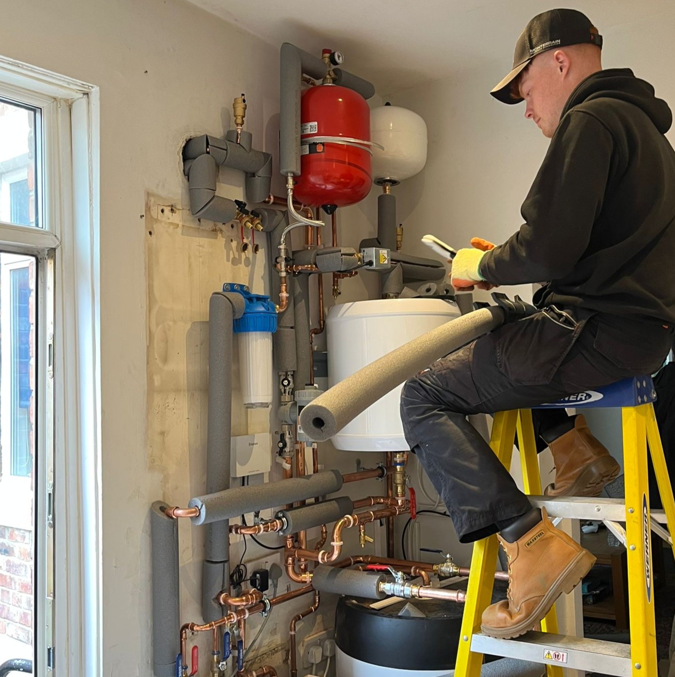 Insulating pipework for Air Source Heat Pump heating system