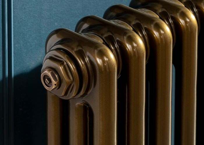 close up photo of golden colored radiator
